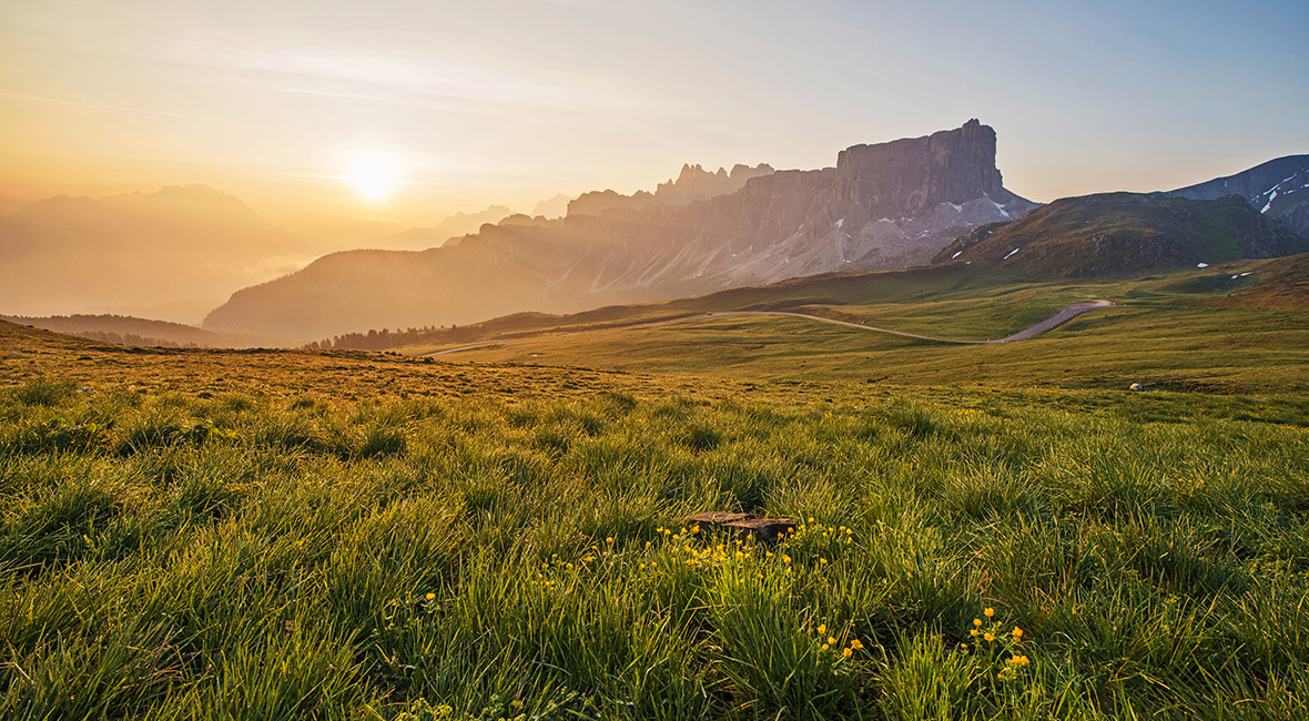 Mountain Panorama of the Dolomites as viewed from passo di Giau (as viewed from the mountain pass Giau). Photograph was taken just after the sunrise from the top of the pass.