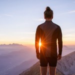 Male hiker observing the sunset