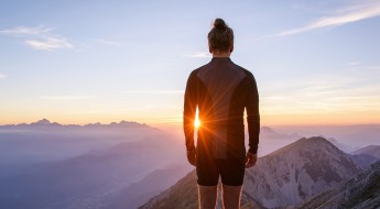 Male hiker observing the sunset